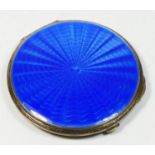 A silver and guilloche enamel powder compact, Birmingham 1936, with engine turned back, opening to