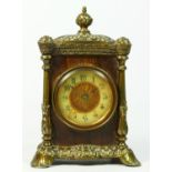 A late 19th century mahogany cased & gilt brass mantel clock, enamelled dial with arabic numerals, 8