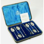 A Victorian silver set of tea spoons and tongs, London 1981, with shell bowls and twist stems, 89.