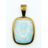 A 9ct gold mounted opal pendant, by M.D., Sheffield 2003, stone 16 x 12mm.