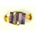 A 9ct gold and facetted dome cut amethyst dress ring, k 1/2, 2.8gm