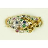 An 18ct gold, diamond, ruby, emerald and sapphire leopard ring, by ZJ, London 1991, realistically