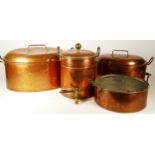 An oval copper two handled lidded pan, 43 x 35cm, another 38 x 27cm, a circular pan and a hot