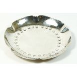 A silver Arts and Craft pin dish, by Arthur Duckworth, Chester 1946, of hammered finish, diameter