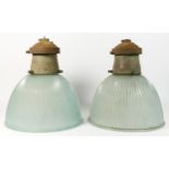 A pair of mid 20th century holophane prismatic glass pendant ceiling lights, with