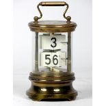 A U.S.A 'Ever-Ready' ticket desk clock, the brass case of cylindrical form with moulded top and