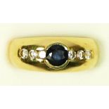 An 18ct gold, sapphire and brilliant cut diamond dress ring, stated weight 0.48cts, colour