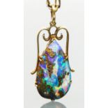 A yellow gold mounted pear shape black boulder opal pendant, 25 x 14mm, to a later 9ct gold 48cm