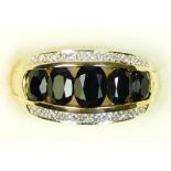 A 9ct gold, graduated sapphire and diamond panel ring, P, 5.3gm