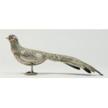 A Spanish silver model of a peacock, bearing control marks, red glass eyes, 17.5cm, 32gm