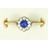 An Edwardian 18ct white gold, unmarked, sapphire and old cut diamond cluster ring, diameter 7mm,