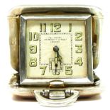 An Art Deco silver and rose gold overlaid purse watch, Birmingham 1933, retailed by P & J Perry, 124