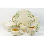 Six pieces of Belleek pottery, shamrock, to include a teapot (spout chipped), milk jug, cream jug,