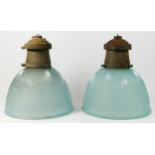A pair of mid 20th century holophane prismatic glass pendant ceiling lights, with