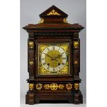A late 19th early 20th Century German mahogany cased bracket clock, the break-arched dial with