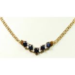 A 9ct gold, sapphire and diamond front necklace, to a fancy link chain, 43cm, 4.6gm, case.