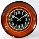 A 1970s ceramic wall clock, made in Germany, incorporating a Westclox quartz movement. 26cm