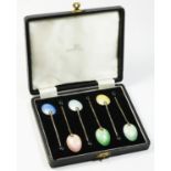 An Art Deco silver and enamel coffee bean spoon set of six spoons, unmarked, stamped ENGLAND, 53gm