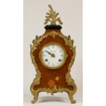 An Italian Kingwood and brass 8 day Louis XIV style mantel clock, with floral marquetry inlay,