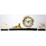 A 1920s/30s Art Deco veined marble clock & garniture, the circular brass dial with Arabic