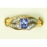 A 14K gold, tanzanite and diamond dress ring, L, 2.6gm