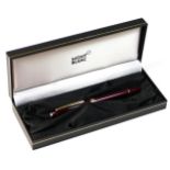 Mont Blanc Meisterstuck, a red body and gold plated fountain pen, 14K gold nib, screw filler,