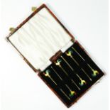 A gilt sterling silver and enamel cockerel set of cocktail sticks, 8.5cm, 26gm, with case