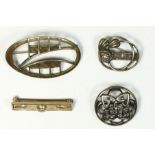 A Carrick silver MacIntosh style brooch and three other brooches, 25gm.