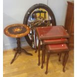 A nest of tables, glass topped with inset leather skivers, on carved cabriole legs, together with