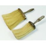 Two Edwardian silver dressing table brushes, Birmingham 1904 and 1902