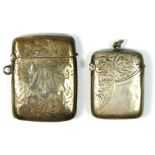 A Victorian silver vesta case, Birmingham 1900, monogramed and another Birmingham 1897, 41.6gm