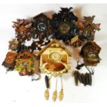 A collection of mid 20th century and later Black Forest cuckoo clocks, for spares or repairs. (2)