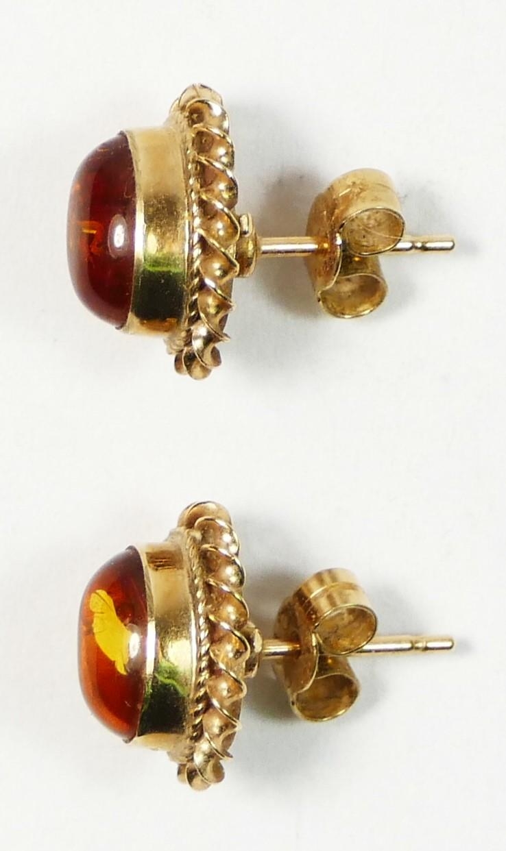 A pair of 9ct gold and amber ear studs, 11 x 9mm, 1.9gm - Image 2 of 2