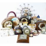 A collection of mid 20th century and later mantel clocks, wall clocks and barometers. (4)