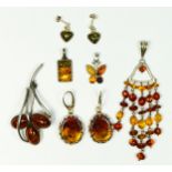 A pair of large 925 silver and amber ear pendants and 5 other amber set pieces, 45gm