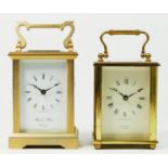 Two English brass carriage clocks, with 8 day movements. 13cm tall, (at fault) (2)
