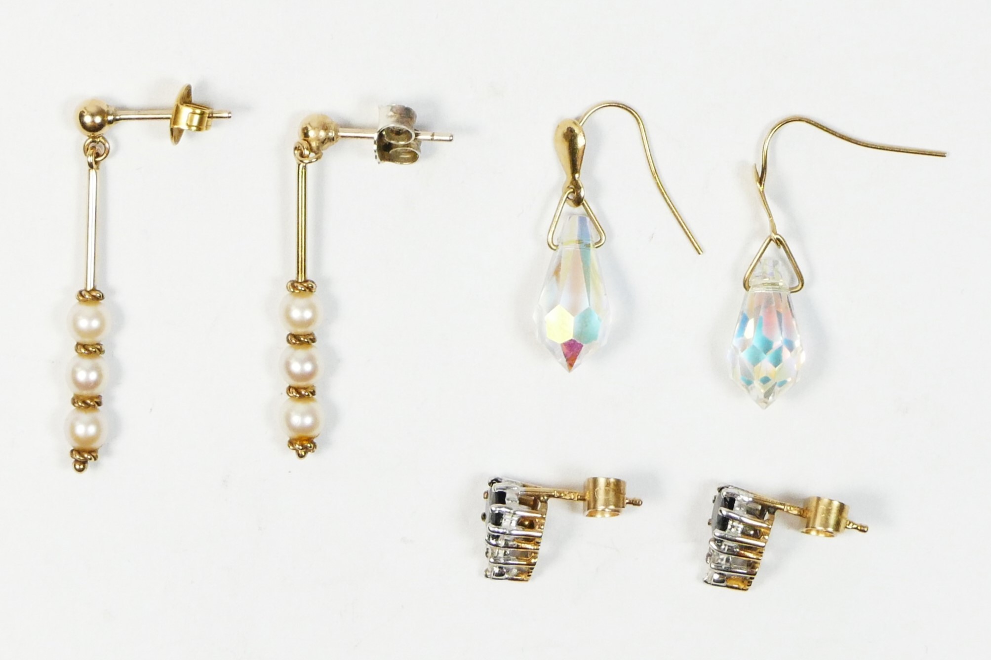 A 9ct gold pair of sapphire and white stone ear studs, 1.5gm and two other pair of ear rings - Image 2 of 2