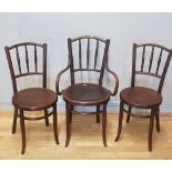 A pair of stained beech bentwood chairs,together with a matching carver chair. (3)
