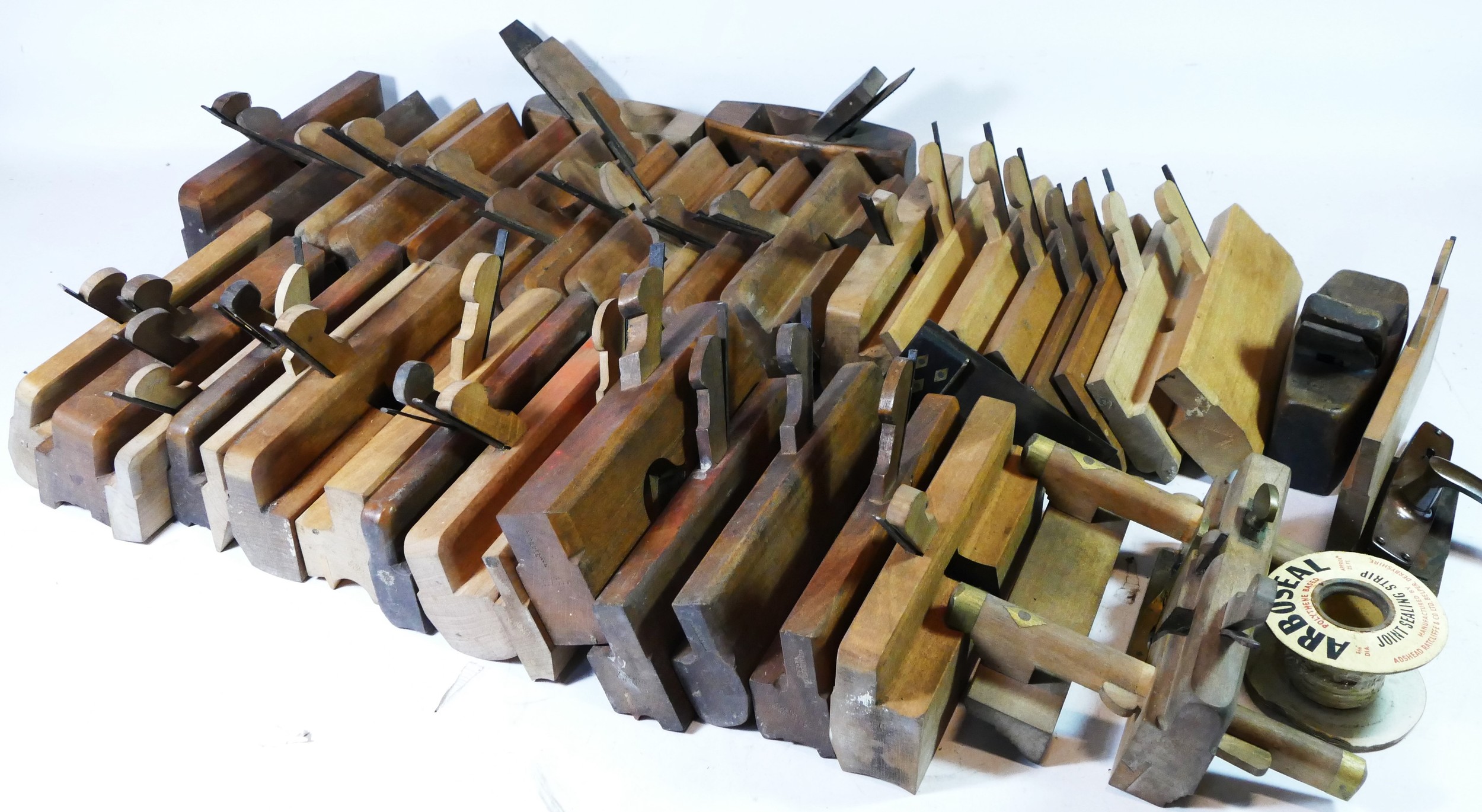 A collection of early 20th century carpenters tools, to include Jack planes, moulding planes, smooth