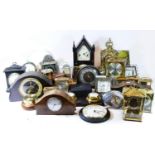 A collection of carriage clocks, mantel clocks, miniature novelty clocks and wall barometers, having