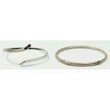 Chamilia, a silver snake skin bangle and a a 925 silver twist bangle, 28gm