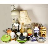 A collection of ceramics, glassware and other cabinet pieces including table lamps.