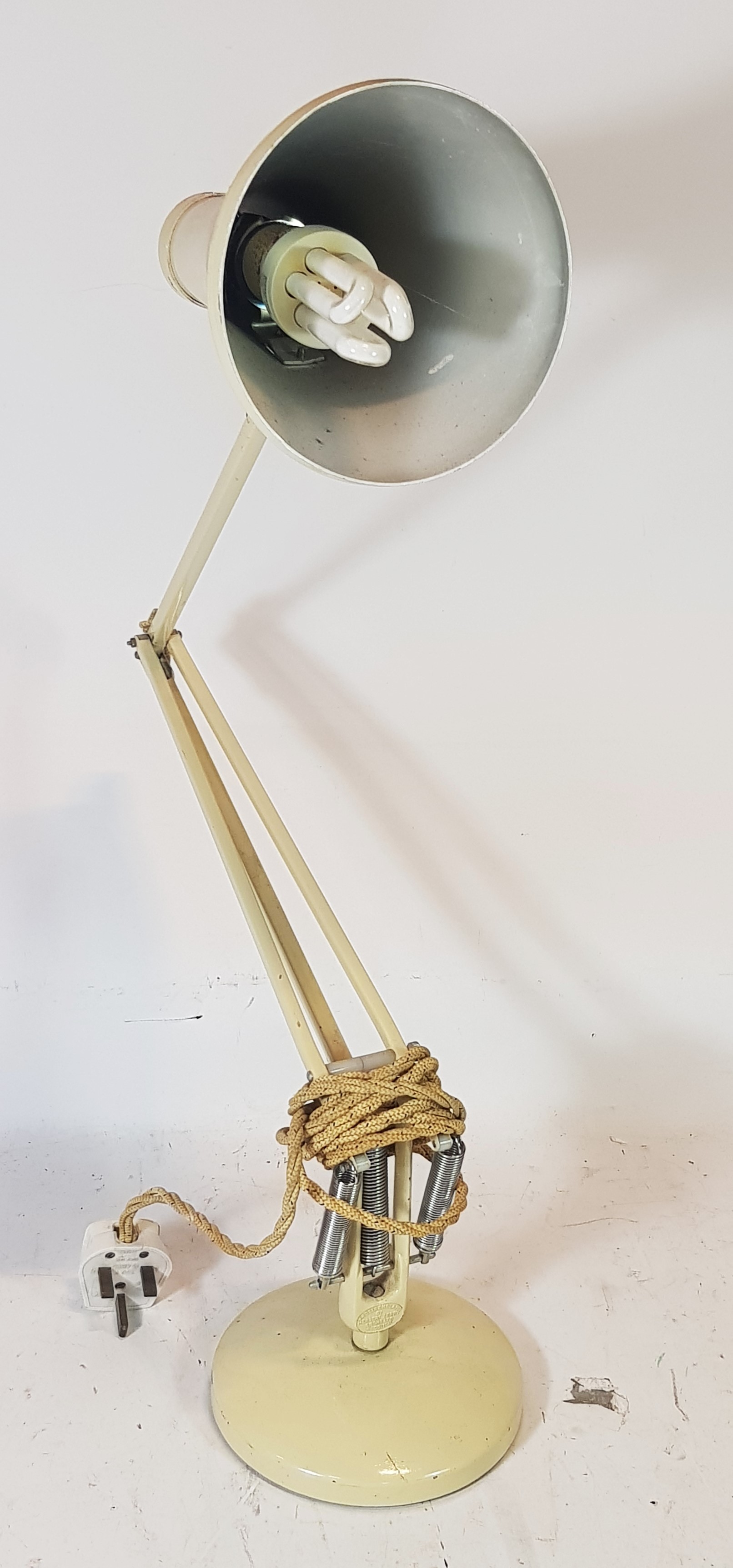 An early 20th century anglepoise lamp, made in England by Herbert Terry & Sons of Redditch. H53cm.