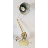 An early 20th century anglepoise lamp, made in England by Herbert Terry & Sons of Redditch. H53cm.