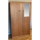 A Symbol Furniture single wardrobe / companion with full length wardrobe beside a mirror fronted