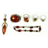 A silver and amber set bracelet and five other amber set pieces, 41gm