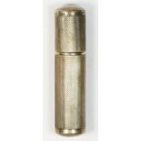 A Sterling Silver petrol lip stick lighter, engine turned decoration, 6 x 1.5cm