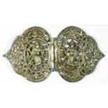 An Indian silver belt buckle, multiple lead repairs to the back, 14 x 8cm, 92gm