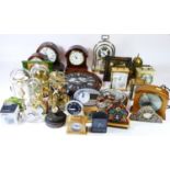 A collection of mid 20th century and later mantel clocks, to include traveling alarm clocks and