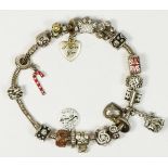 Pandora, a silver charm bracelet, 68gm